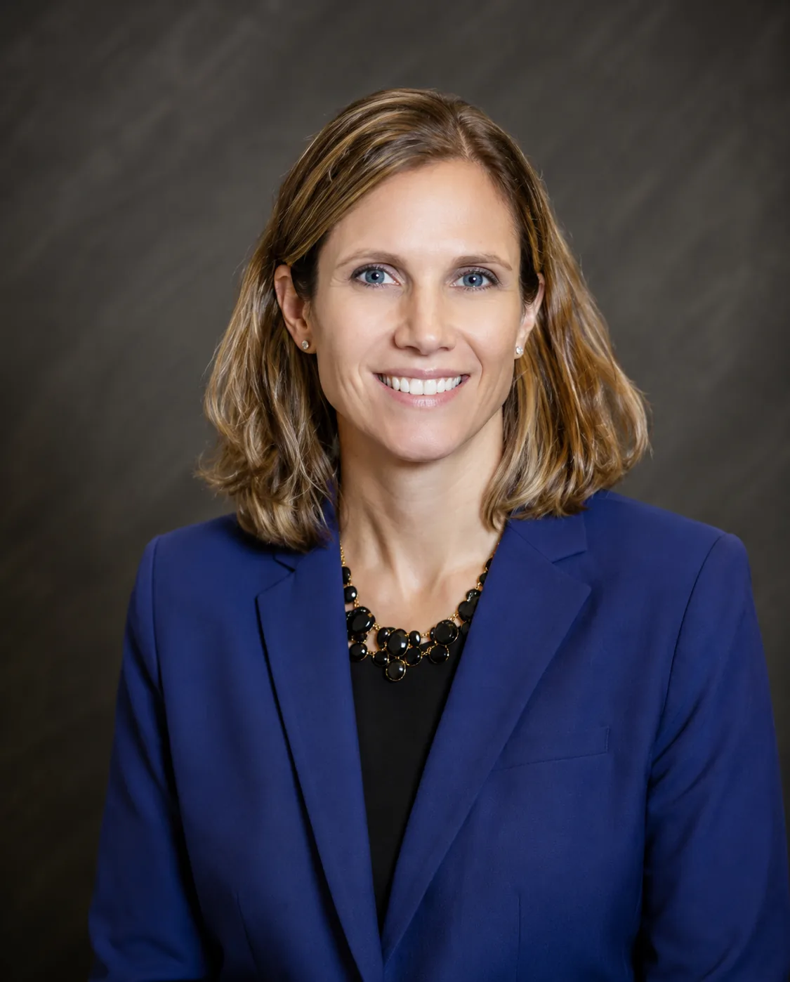 female_blue_blazer_headshot_1500x1865